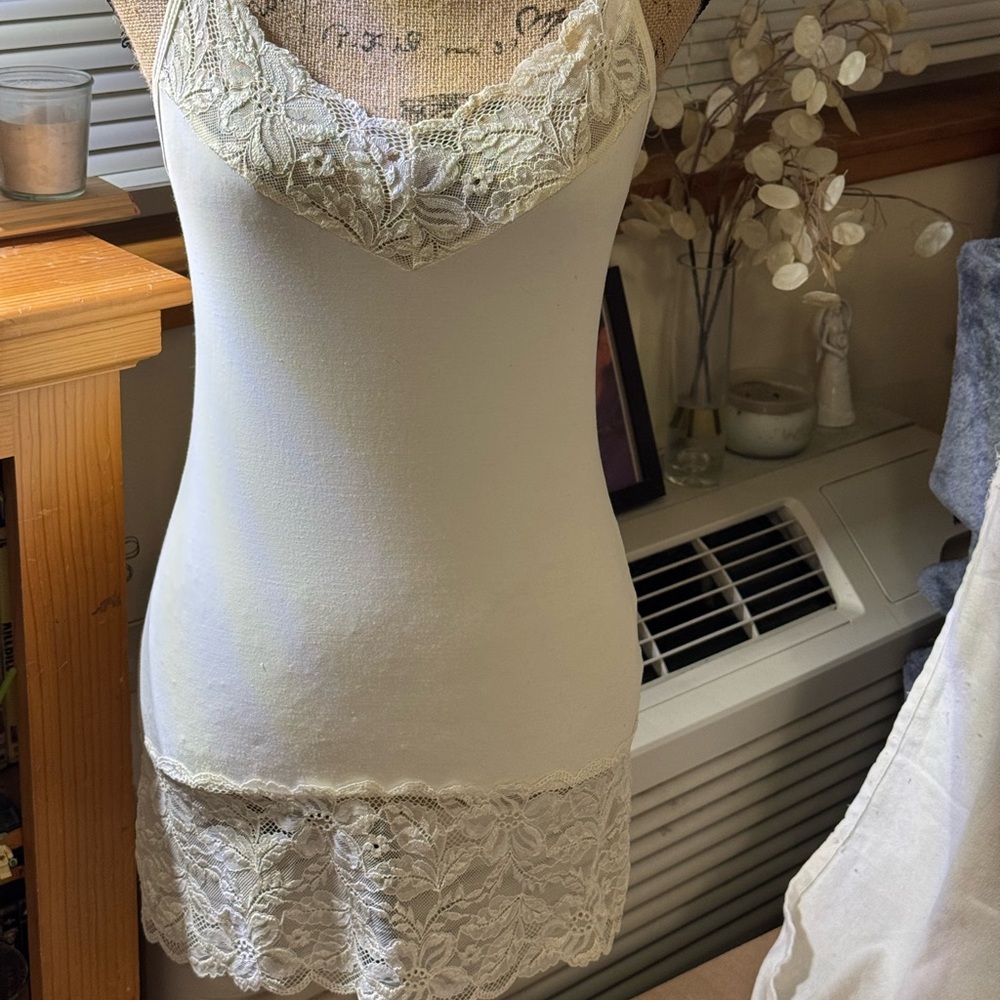 WHBM cream colored, lace lined nighty. Adjustable spaghetti straps. Size Small.
